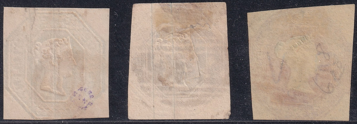 Reverse of the Great Britain embossed 6d, 10d and 1s stamps, showing the raised impressions and paper.
