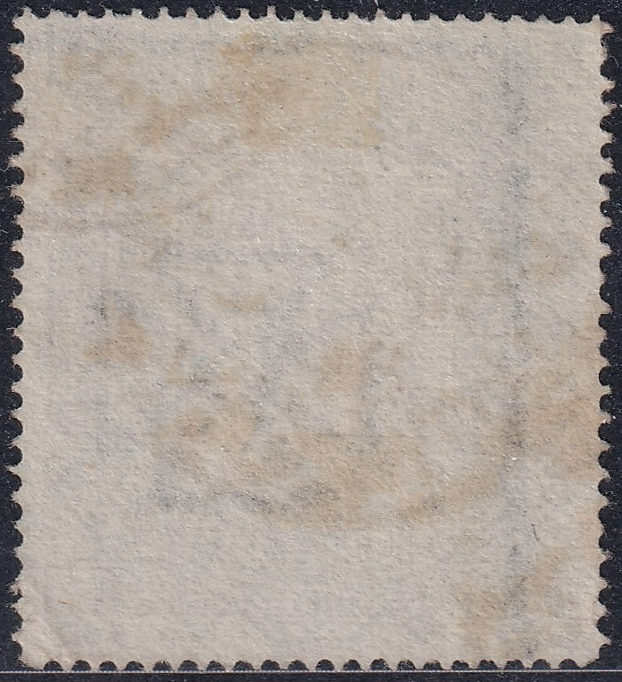 Reverse of the Great Britain 1878 10s greenish grey AF stamp, showing the paper and perforations.