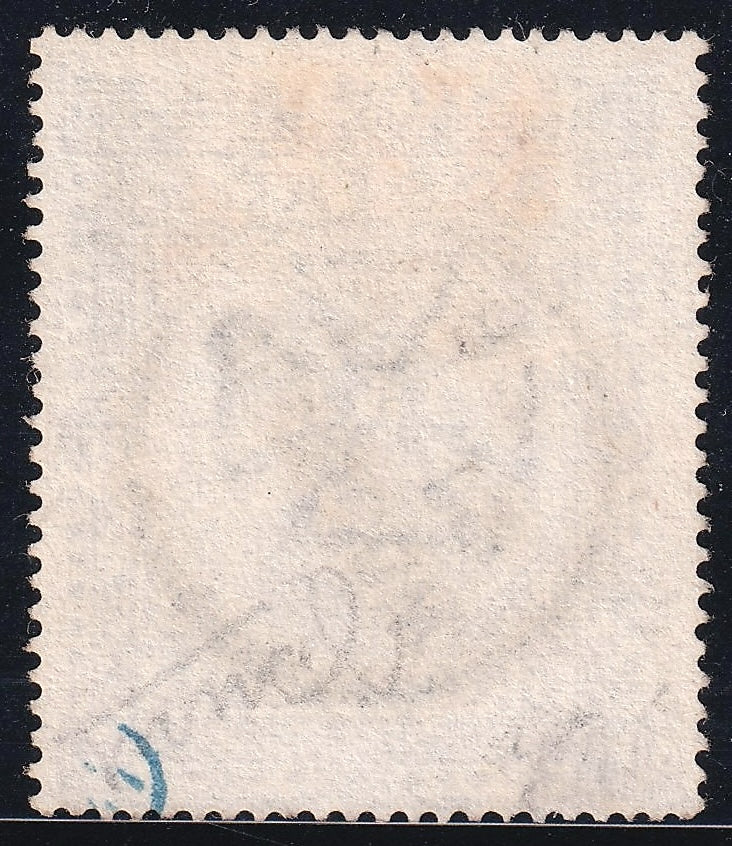 Reverse of the Great Britain 1878 £1 brown-lilac stamp, showing faint markings and a blue mark near the lower-left edge.