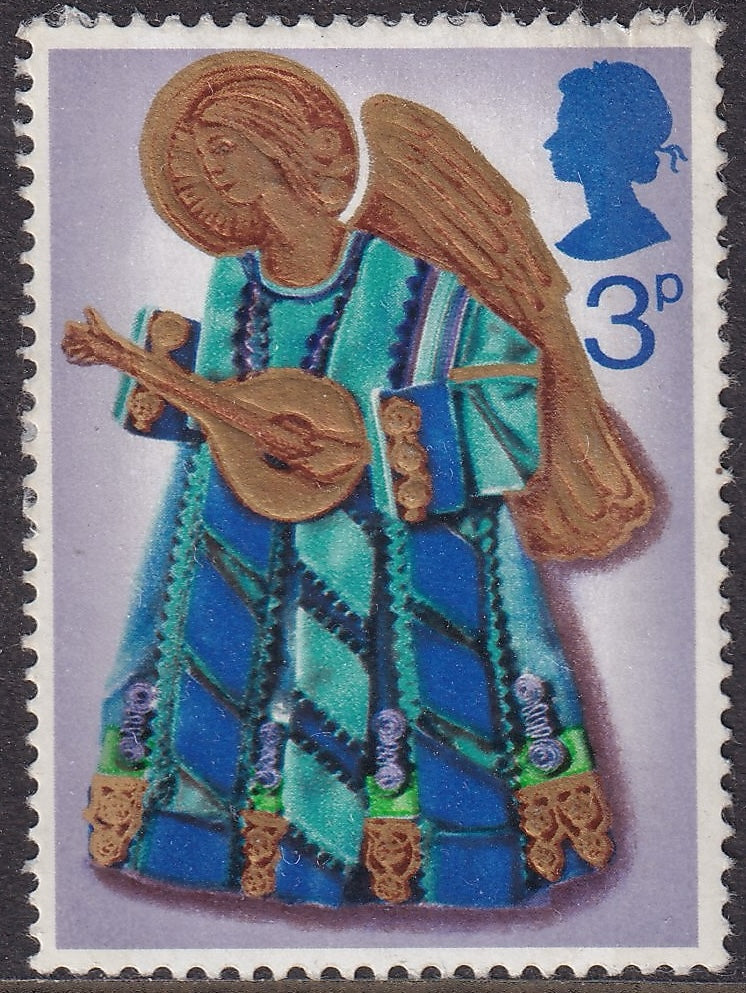 Great Britain 1972 3p Christmas stamp showing an angel playing a lute, with a red-brown printing anomaly.